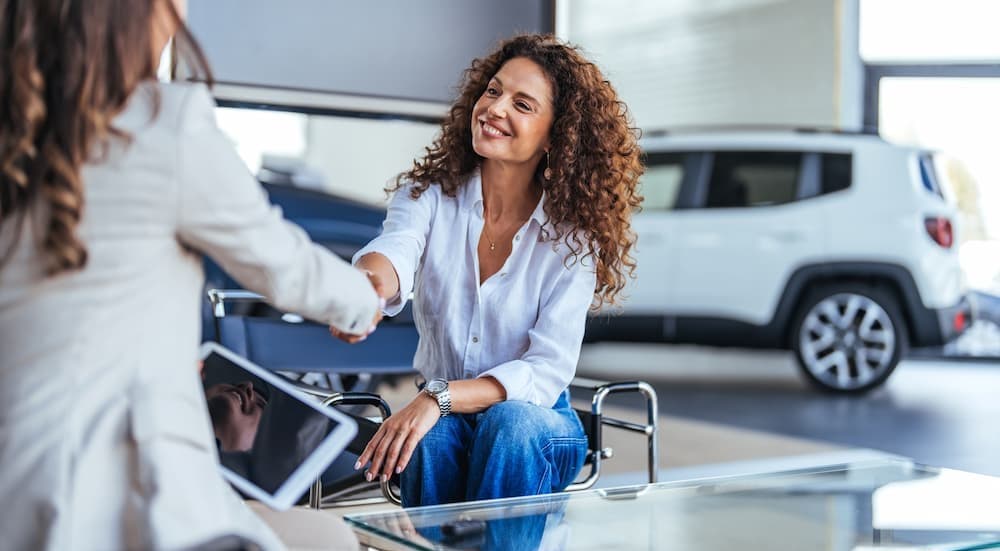 Two people shaking hands.