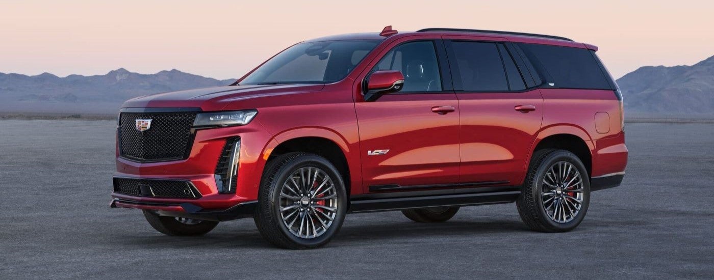 Red 2023 Cadillac Escalade V parked at an angle