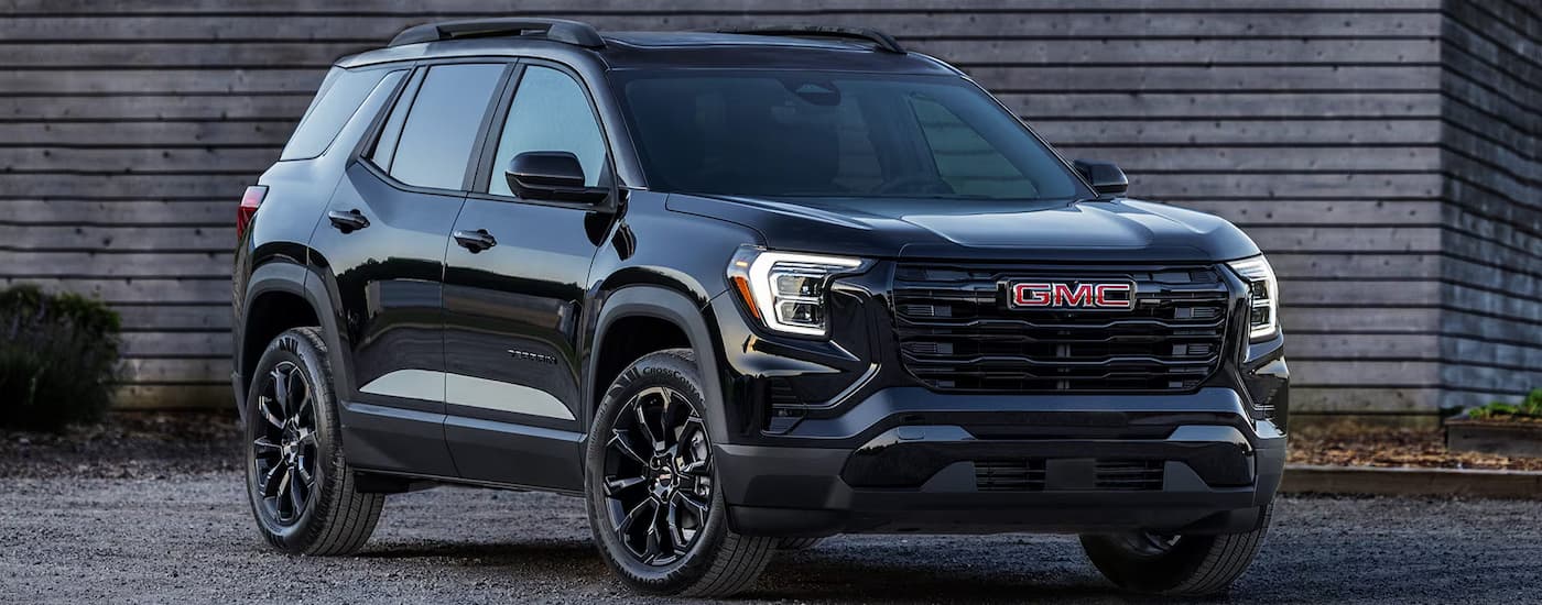 Black 2025 GMC Terrain parked in a driveway