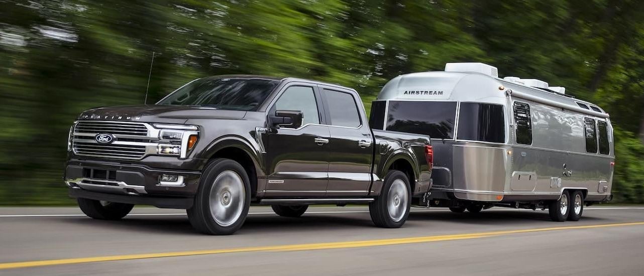 A grey 2022 Ford F-150 from the front at an angle after researching how to 'sell my car.'